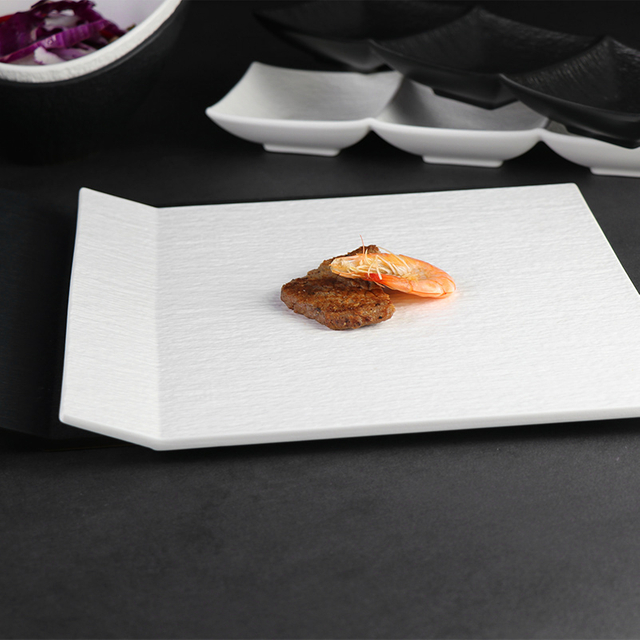 Weißer unregelmäßiger Porzellanteller, quadratischer Essteller mit Griff für Restaurants